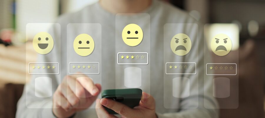 Close-up,Of,Man,Hands,Using,Smartphone,,Rating,Of,The,Quality